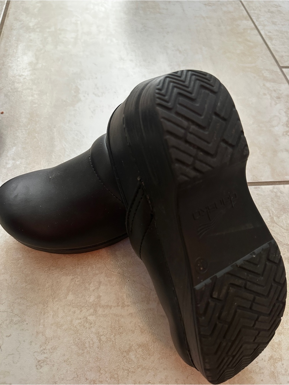 Dansko Black Leather Slip-On Clogs